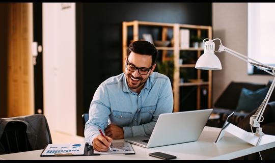 formulary decisions enterprise man working on computer