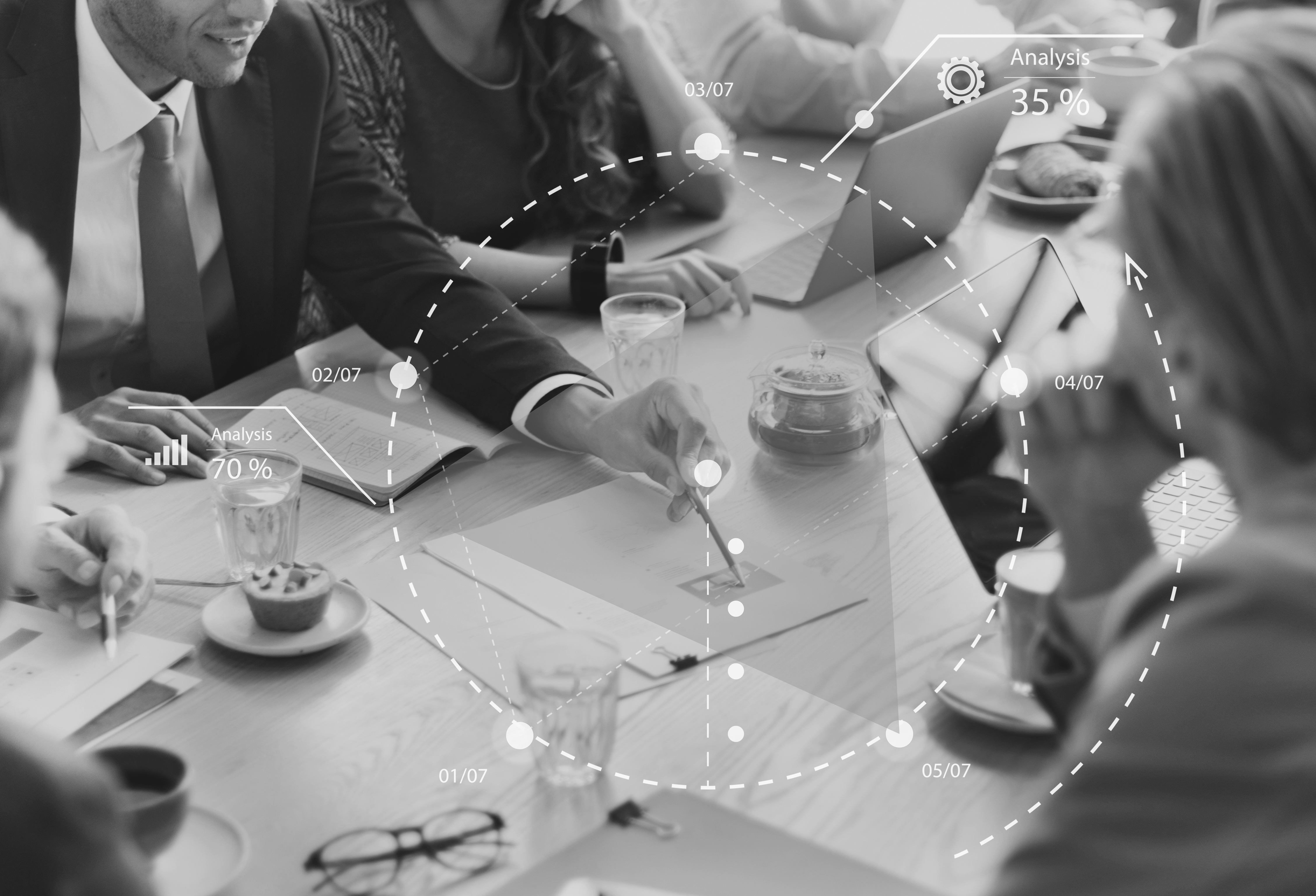 Consultants working around table