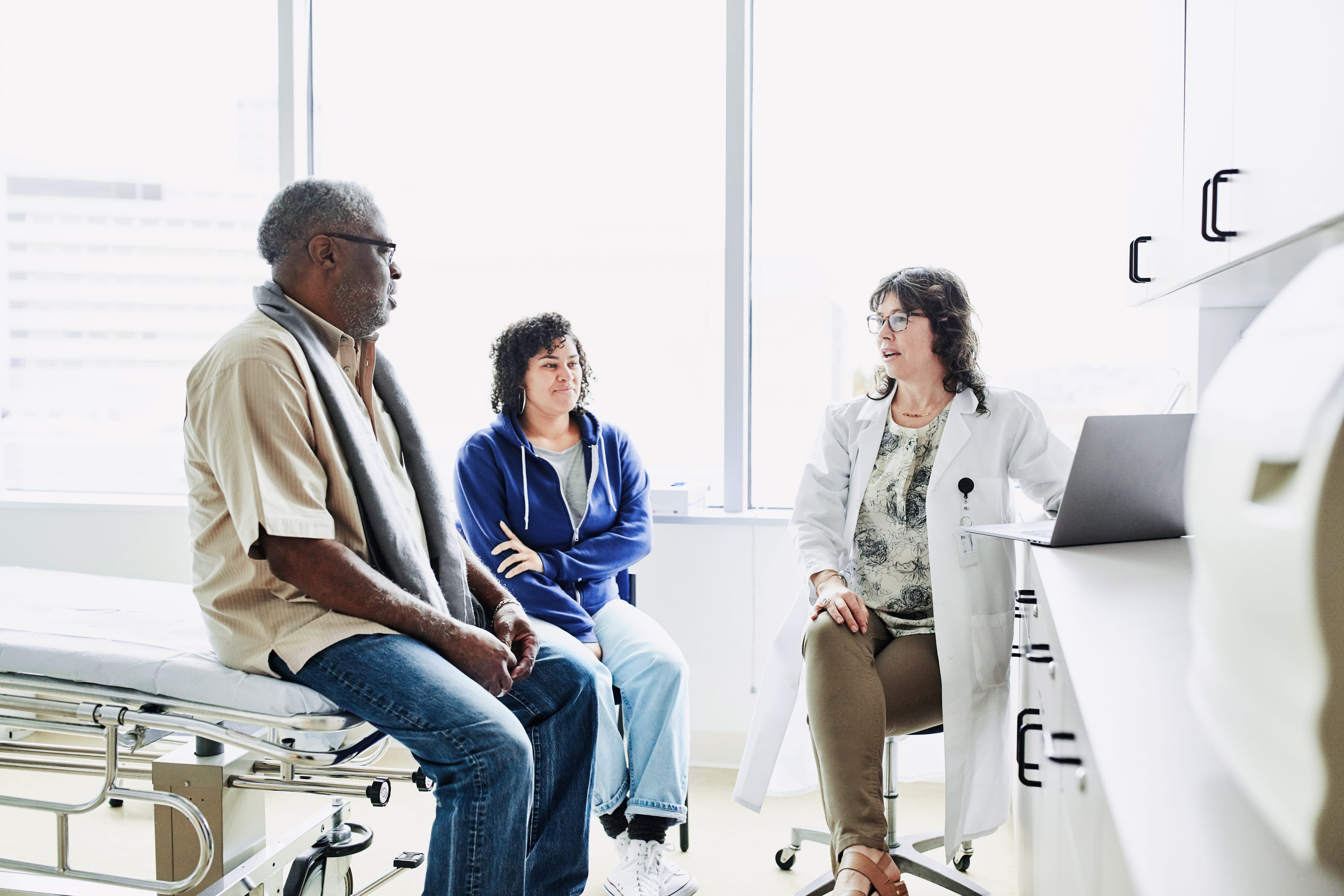 senior in exam office with provider