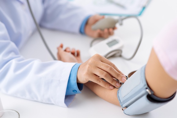 Close up of person getting blood pressure reading