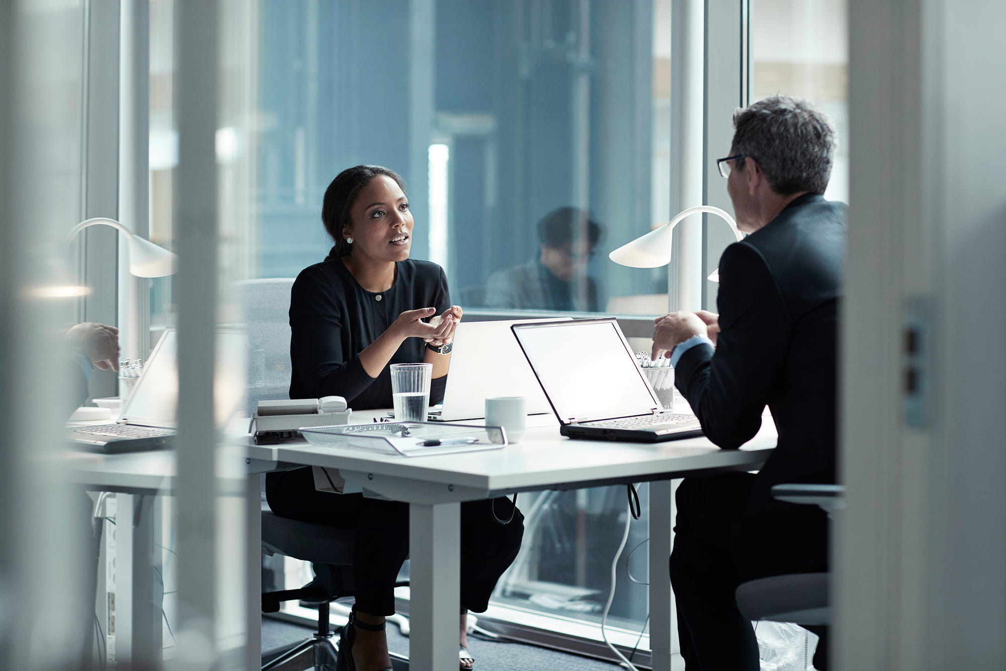 Man and women talking across each other